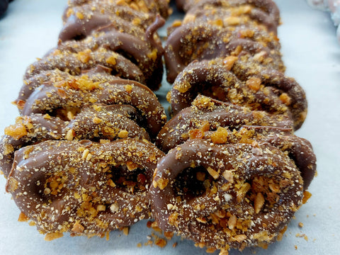 Mini pretzel bites with peanut brittle crumbles